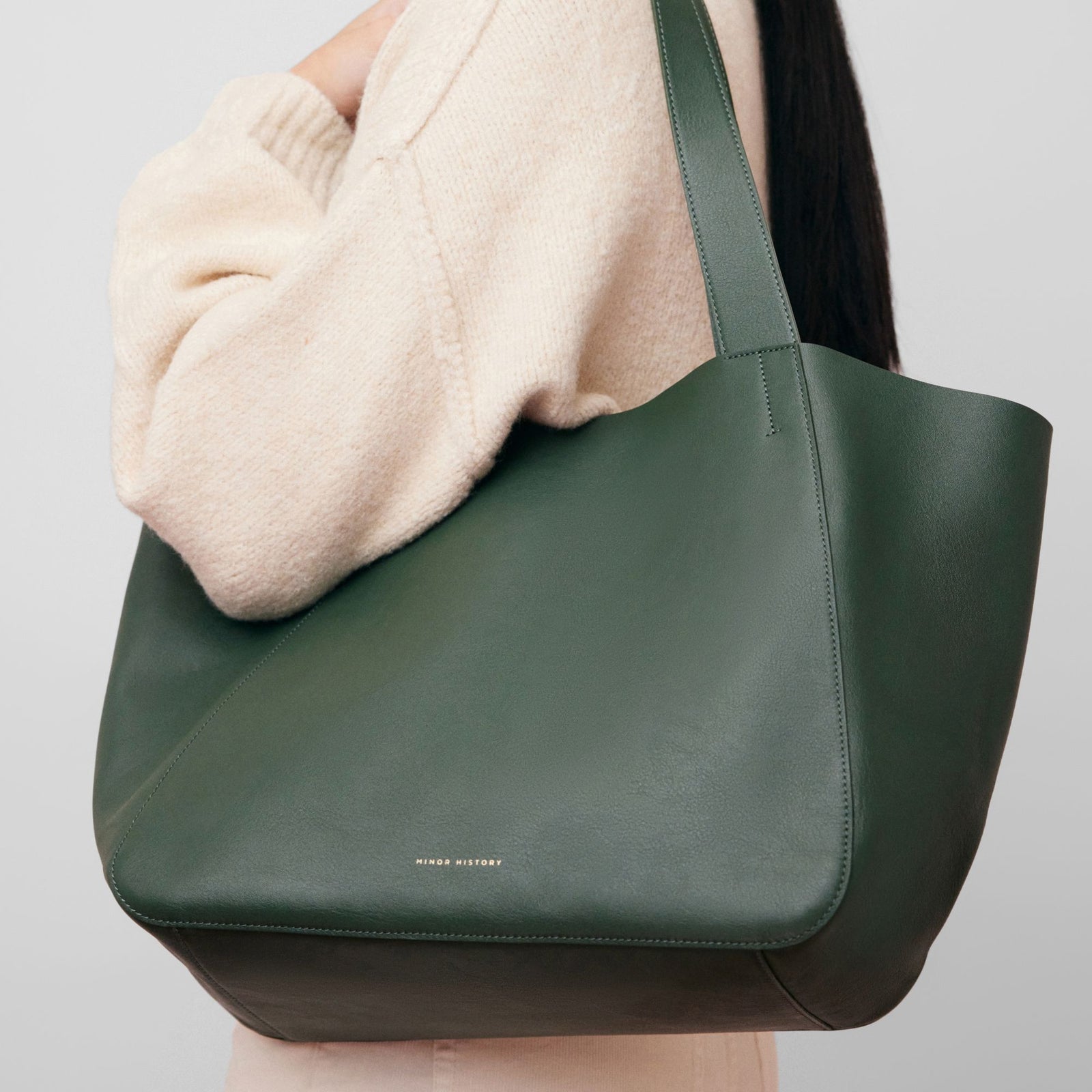 Studio image of black Times Tote from Minor History - Evergreen