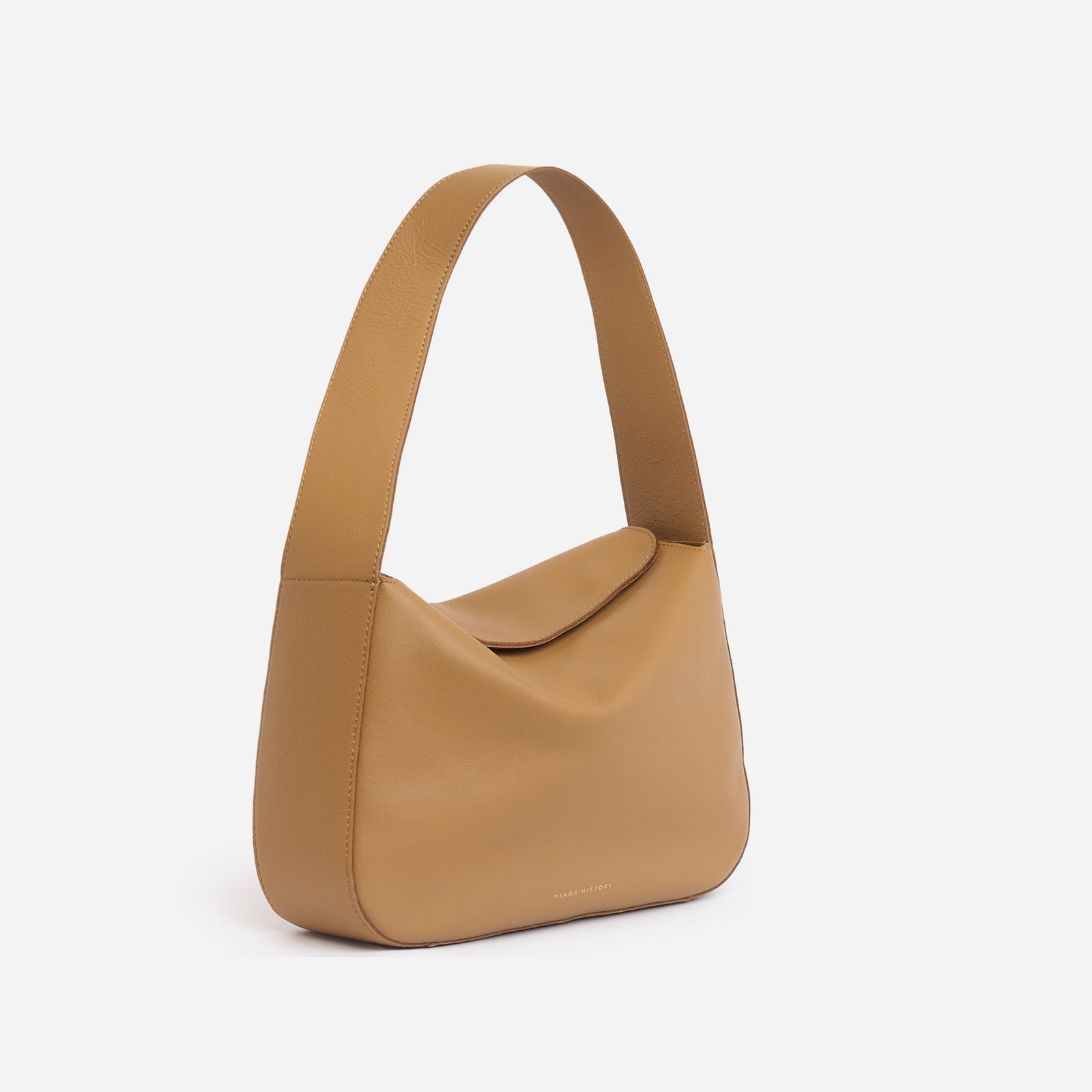 Frame Bag in saddle brown full-grain leather, angled three-quarter view highlighting slouchy profile