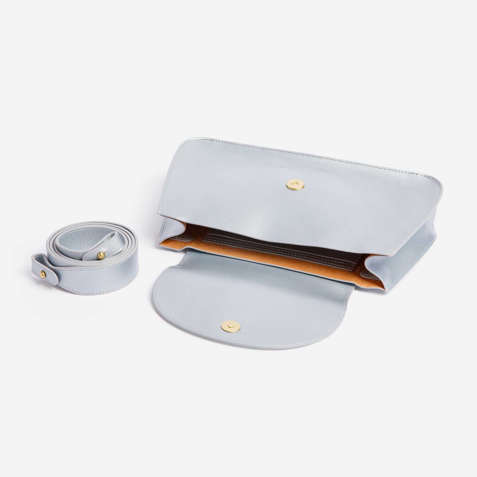 Side view of Horizon Crossbody in Sterling Silver full-grain leather