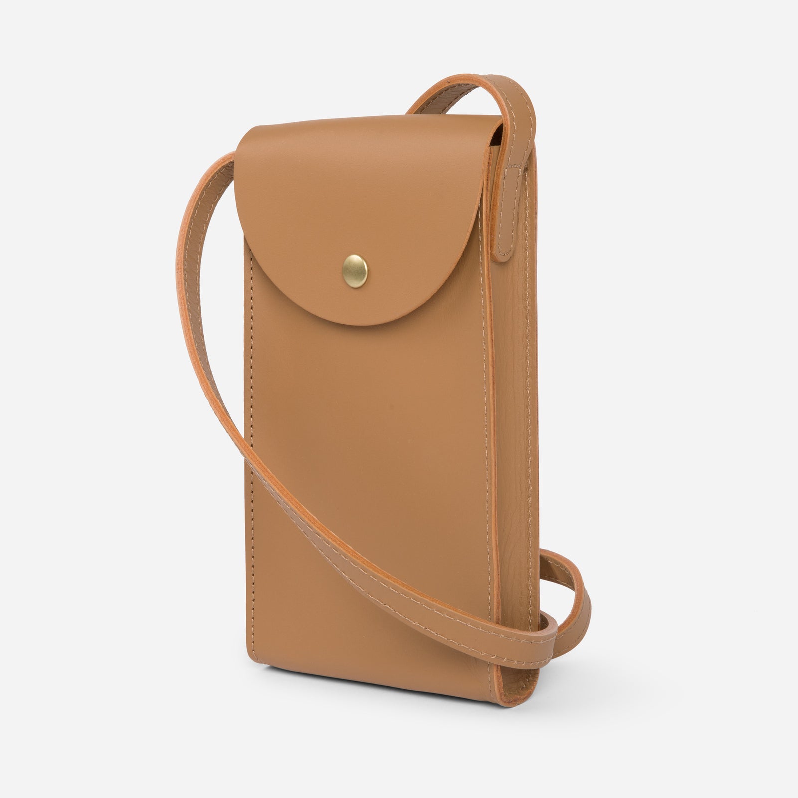 Mini Bandit crossbody bag in saddle brown full-grain leather, compact phone bag with slim profile