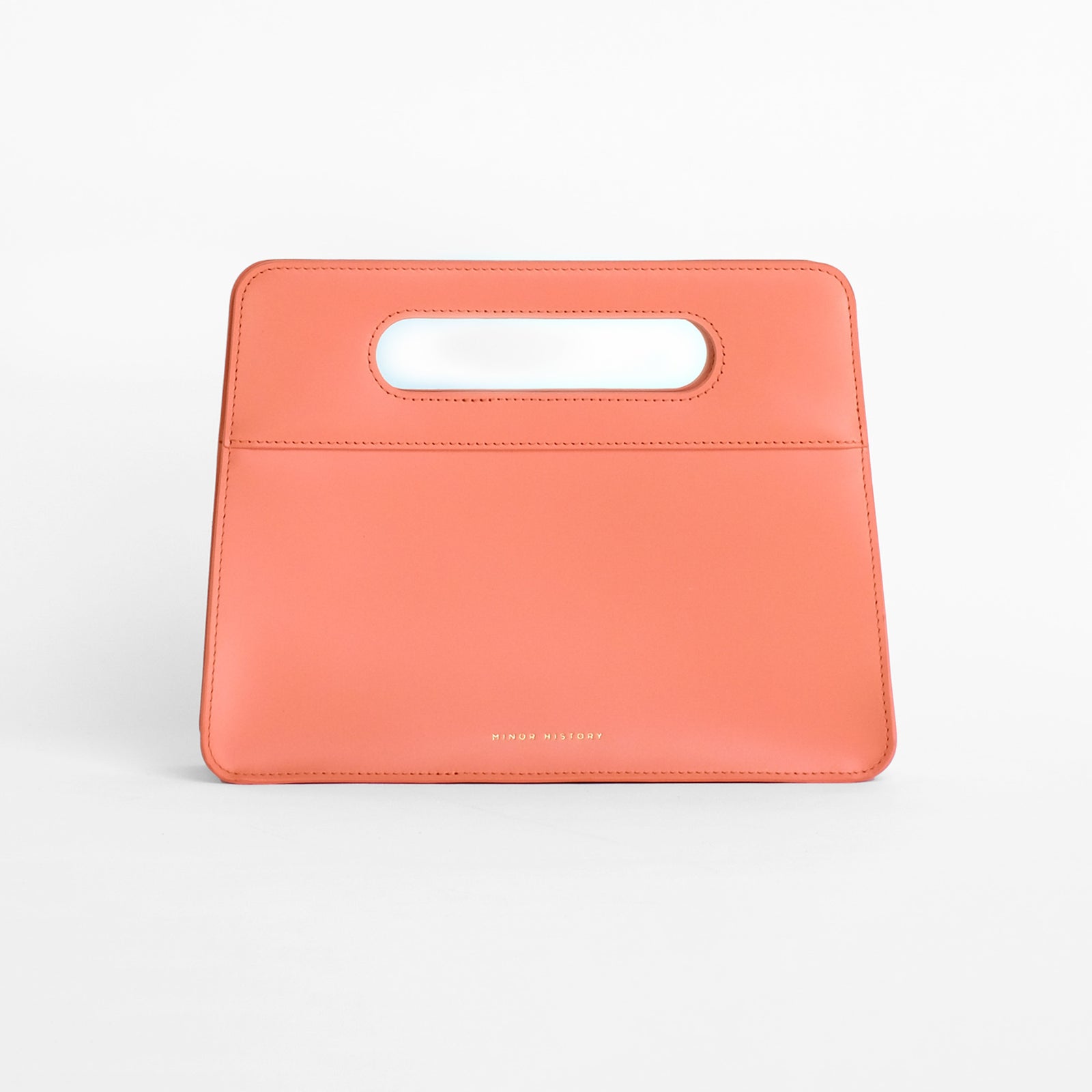 Paloma Afterparty Clutch - bright grapefruit pink leather front view
