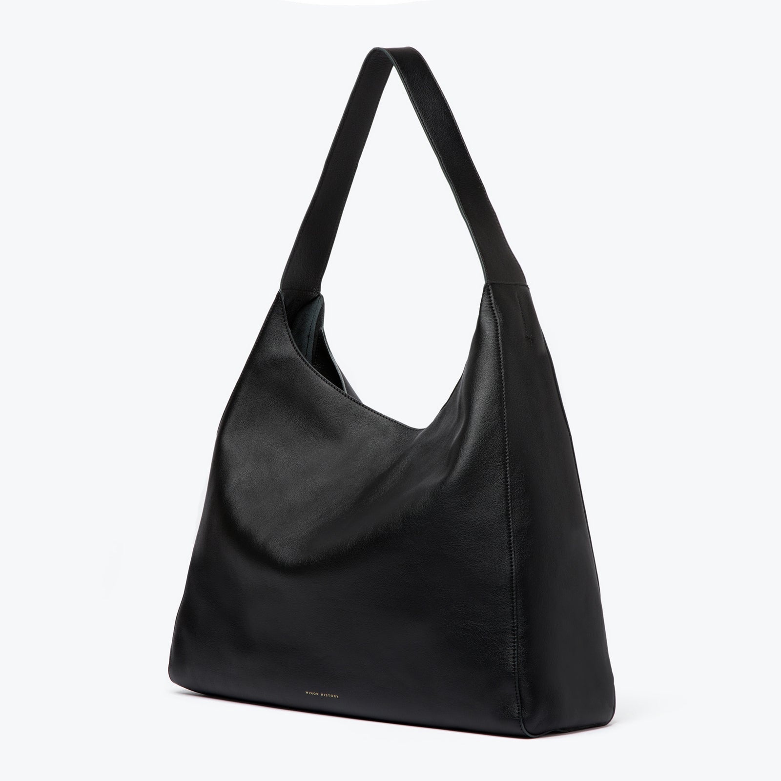 Overtime Tote in full-grain leather, open view showing spacious interior