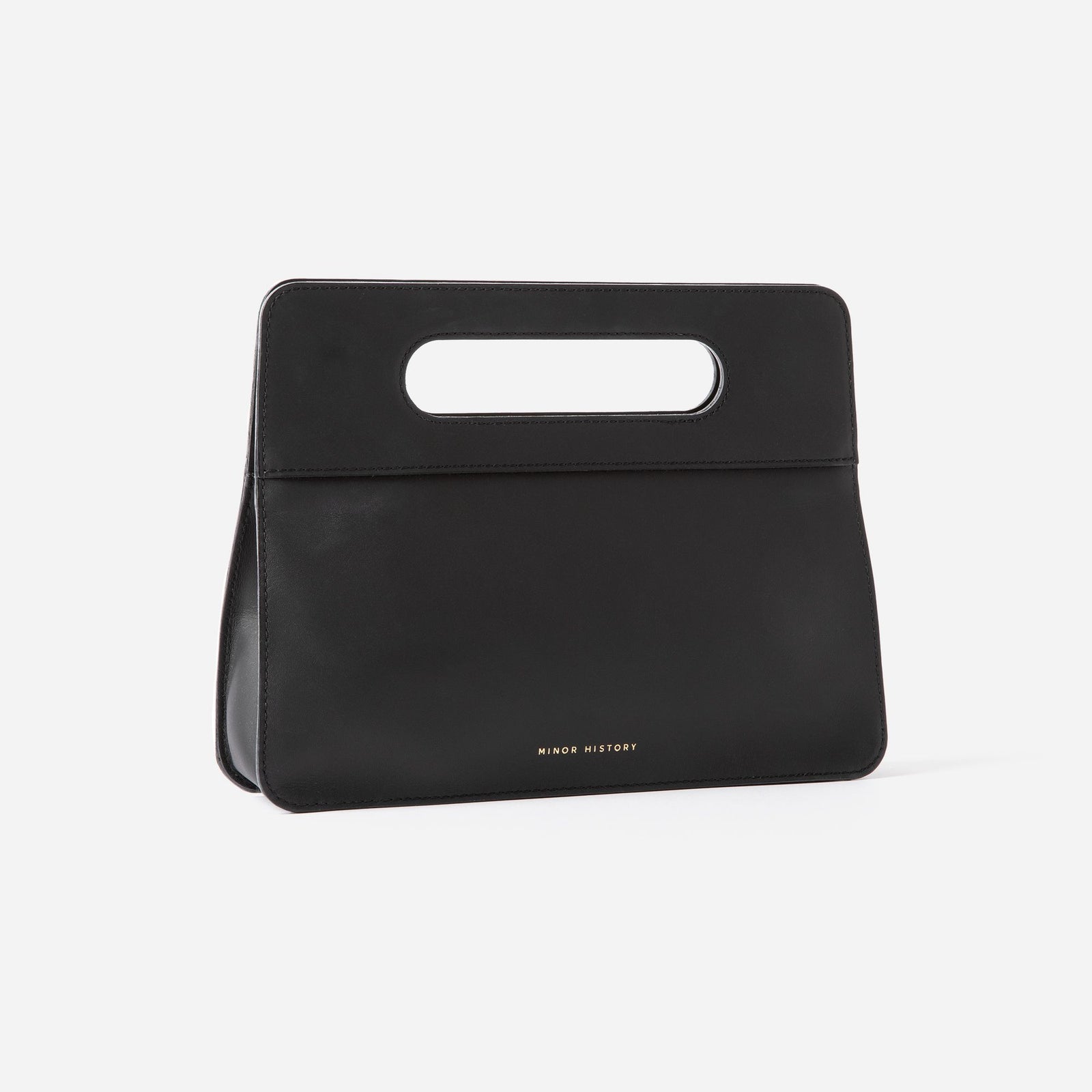 Product styling photo featuring Minor History handbag with natural lighting