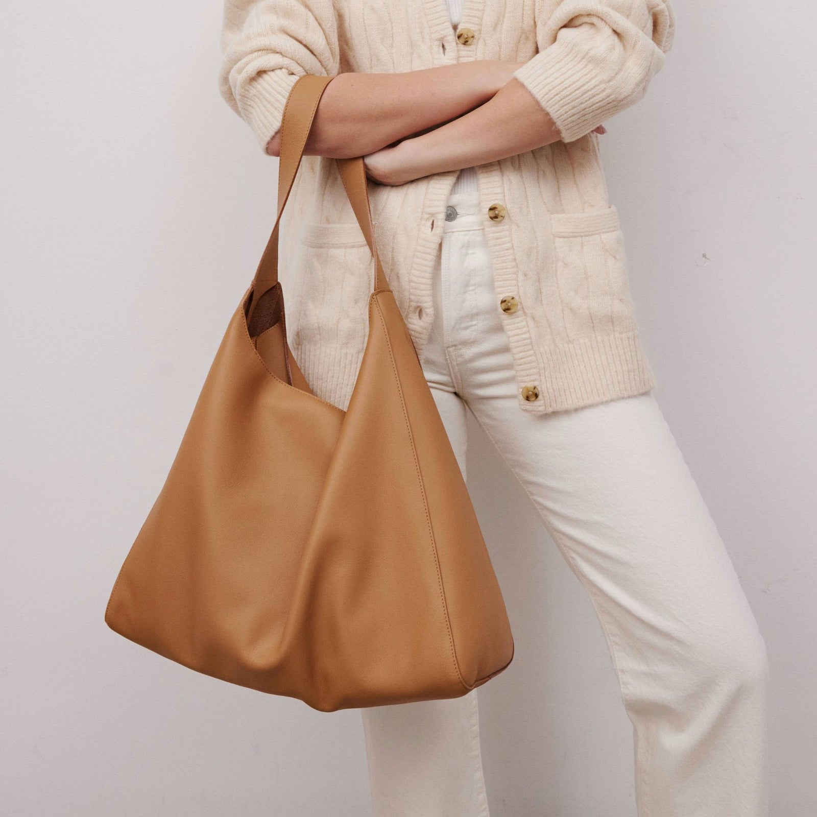 Overtime Tote in full-grain leather, lifestyle image styled with everyday outfit