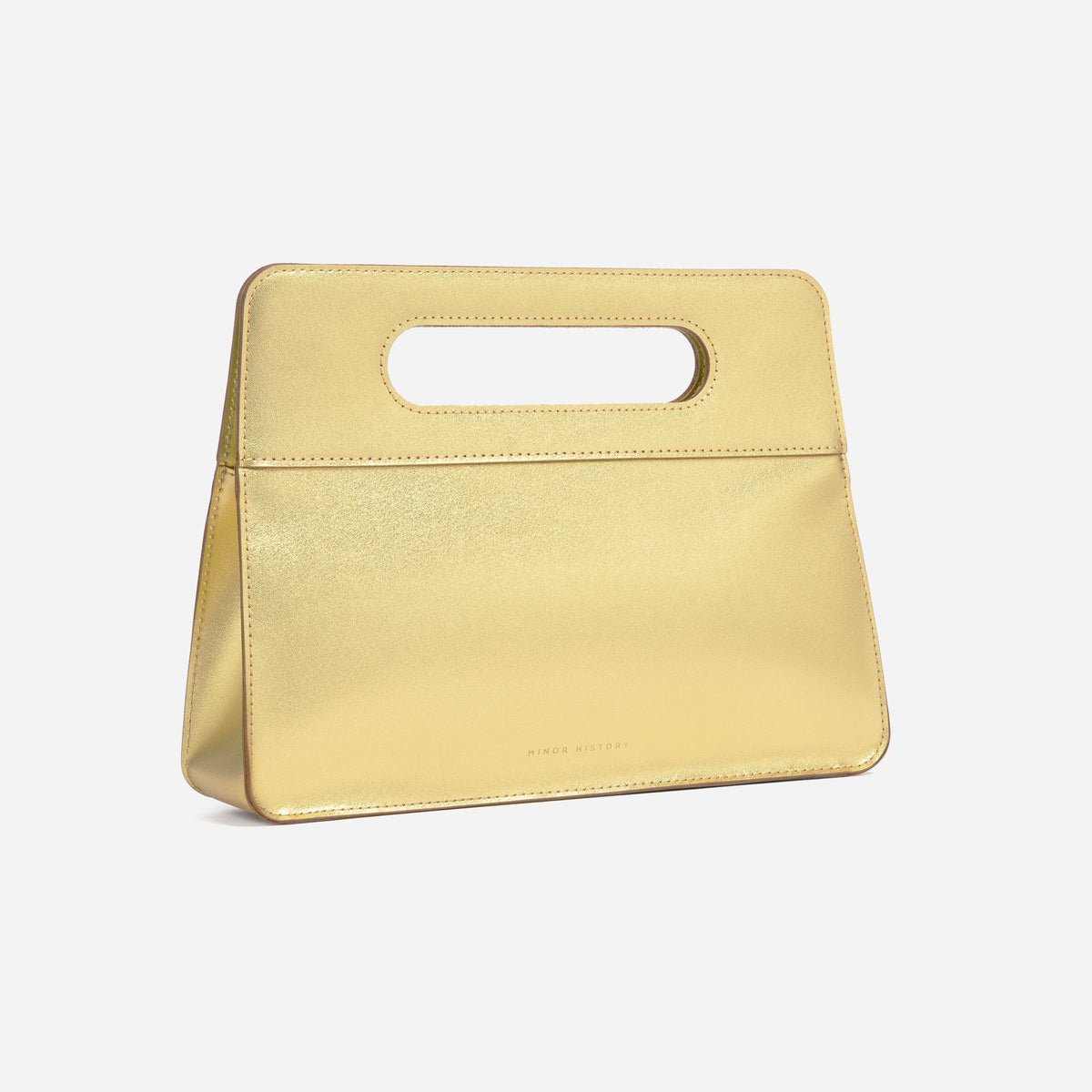 Golden Afterparty Clutch - minimal background, high-contrast lighting