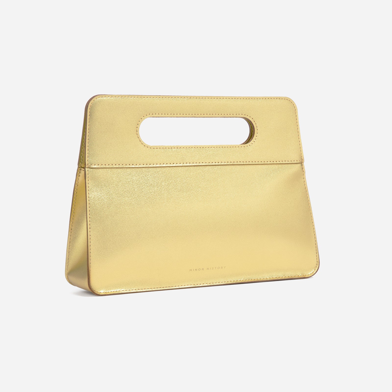 Golden Afterparty Clutch - minimal background, high-contrast lighting