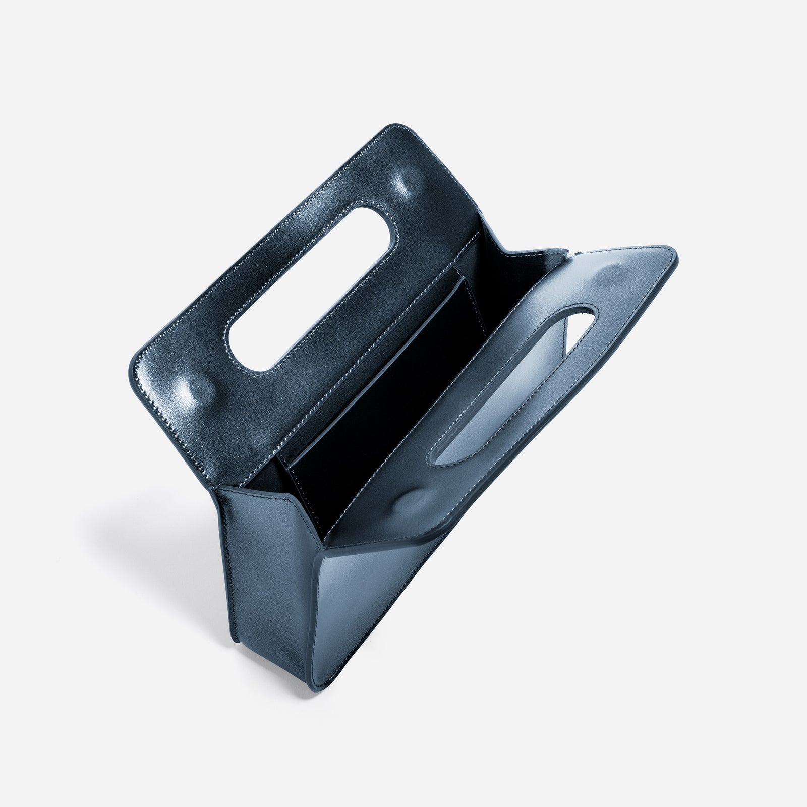 Side angled product photo of Jet black Afterparty clutch