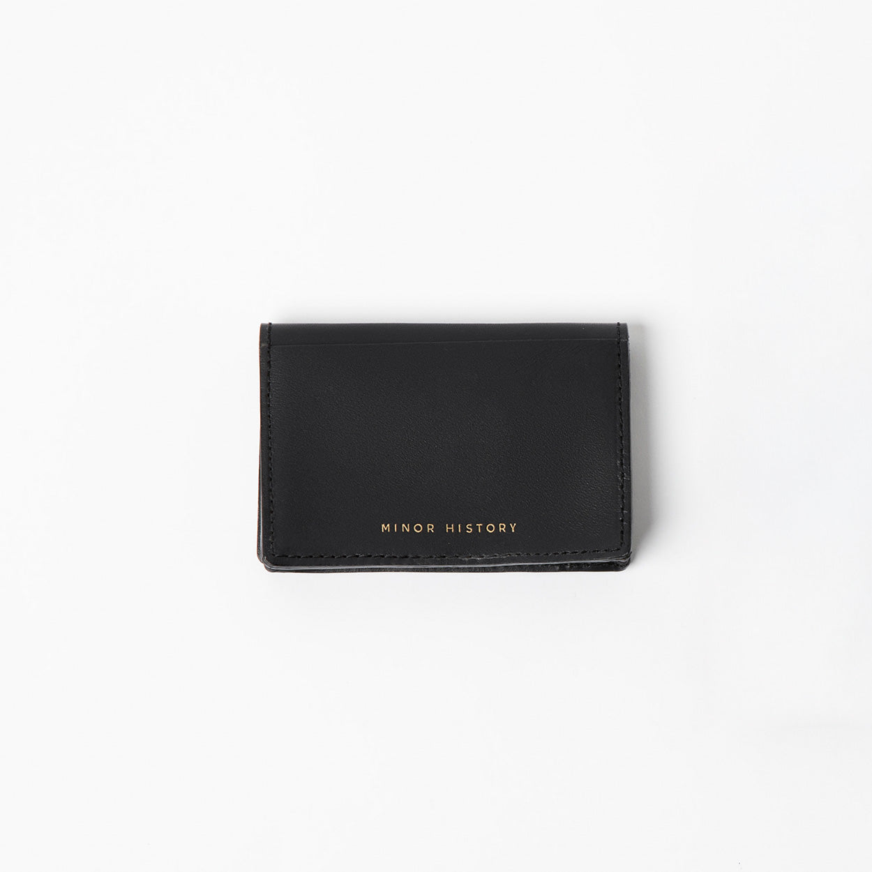 Black cardholder with 'Minor History' branding on a white background -Black