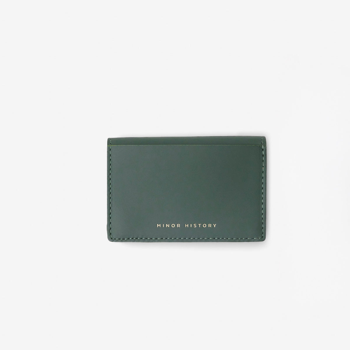 Green wallet with 'MINOR HISTORY' branding on a white background - Evergreen