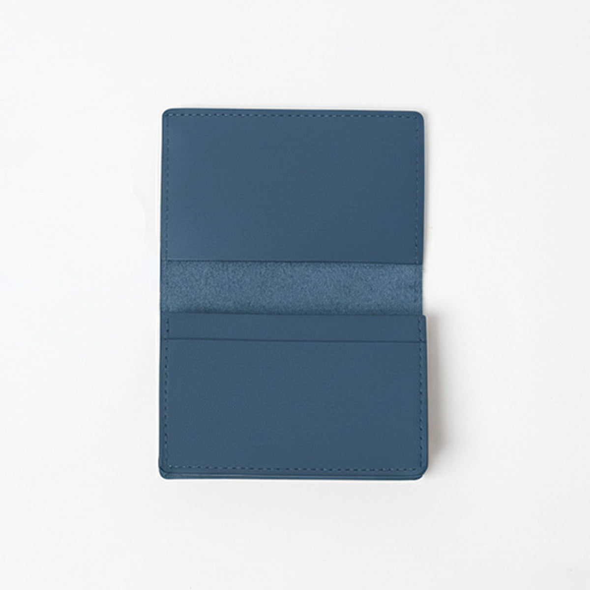 Blue leather cardholder on a white background - Chambray