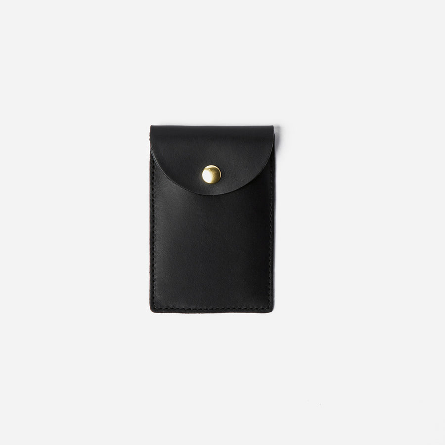 Black Biggie Credit Card Case, closed front view showing the rounded snap flap - Black