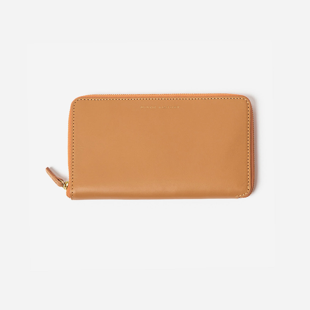 Black wallet with gold zipper on a light gray background - Black