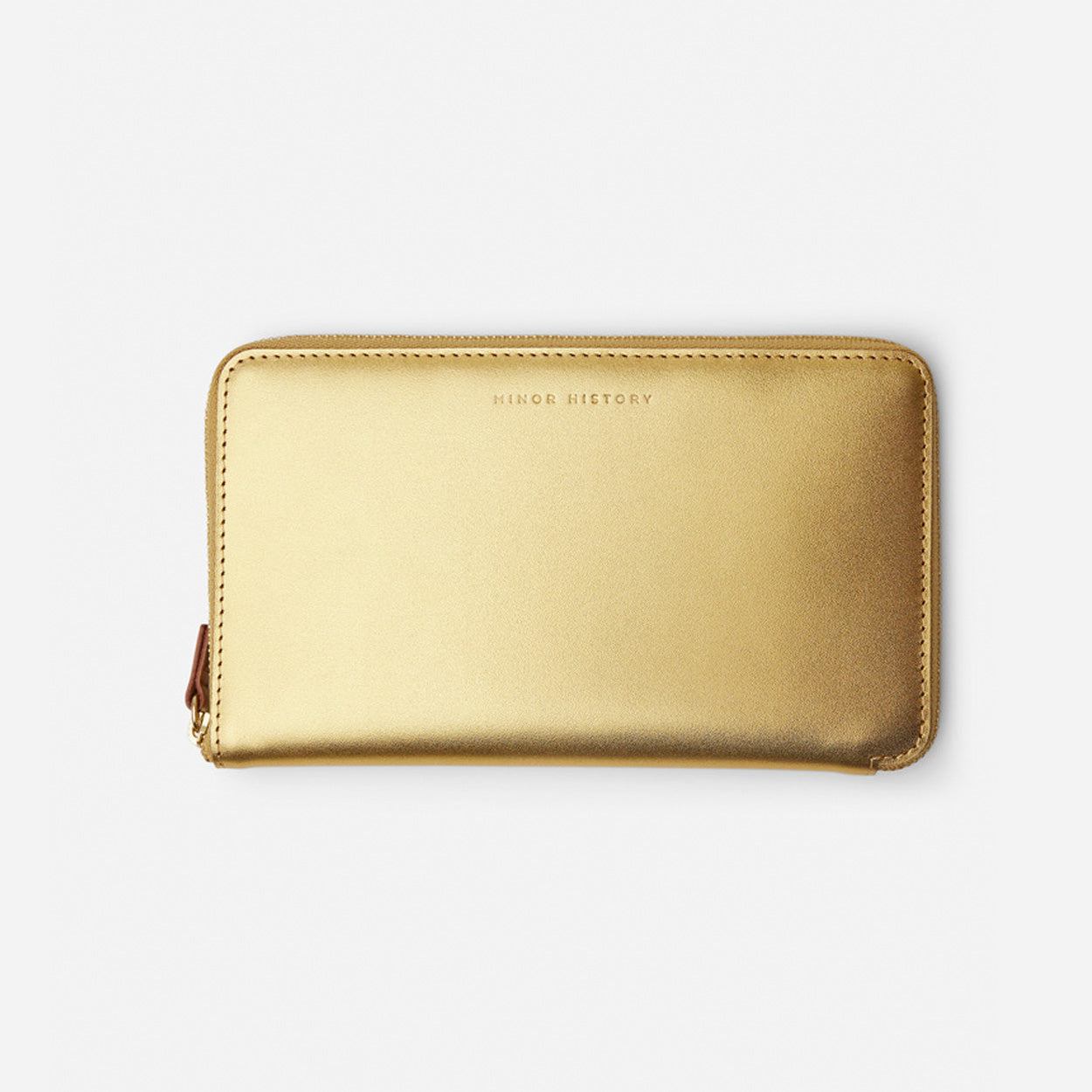 Black wallet with gold zipper on a light gray background - Black