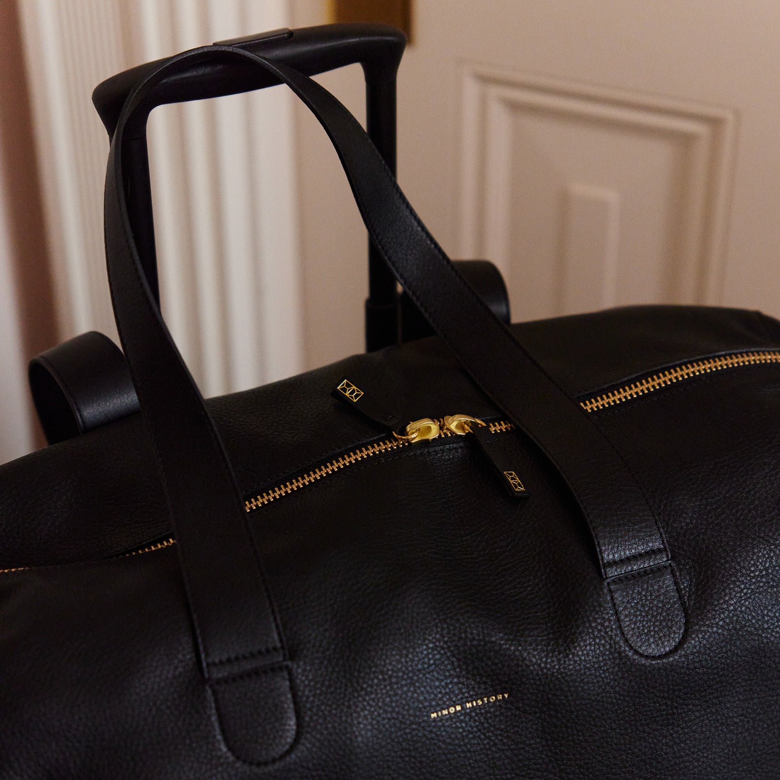 Black leather Getaway Duffle Bag by Minor History