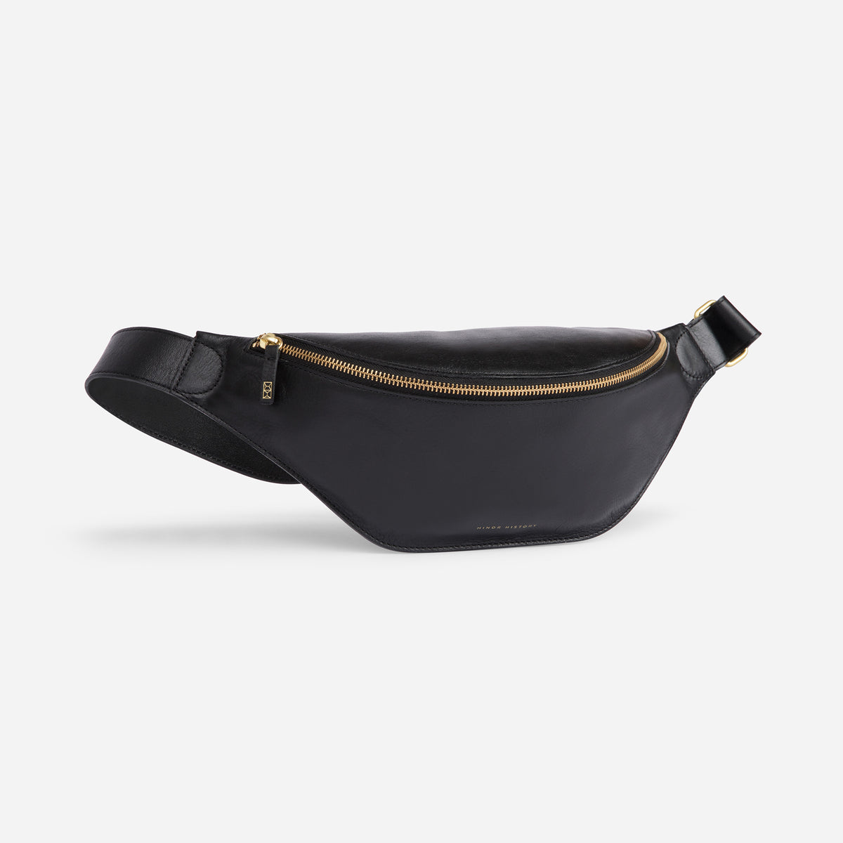 Crosstown belt  bag in black full-grain leather, open view showing organized compartments