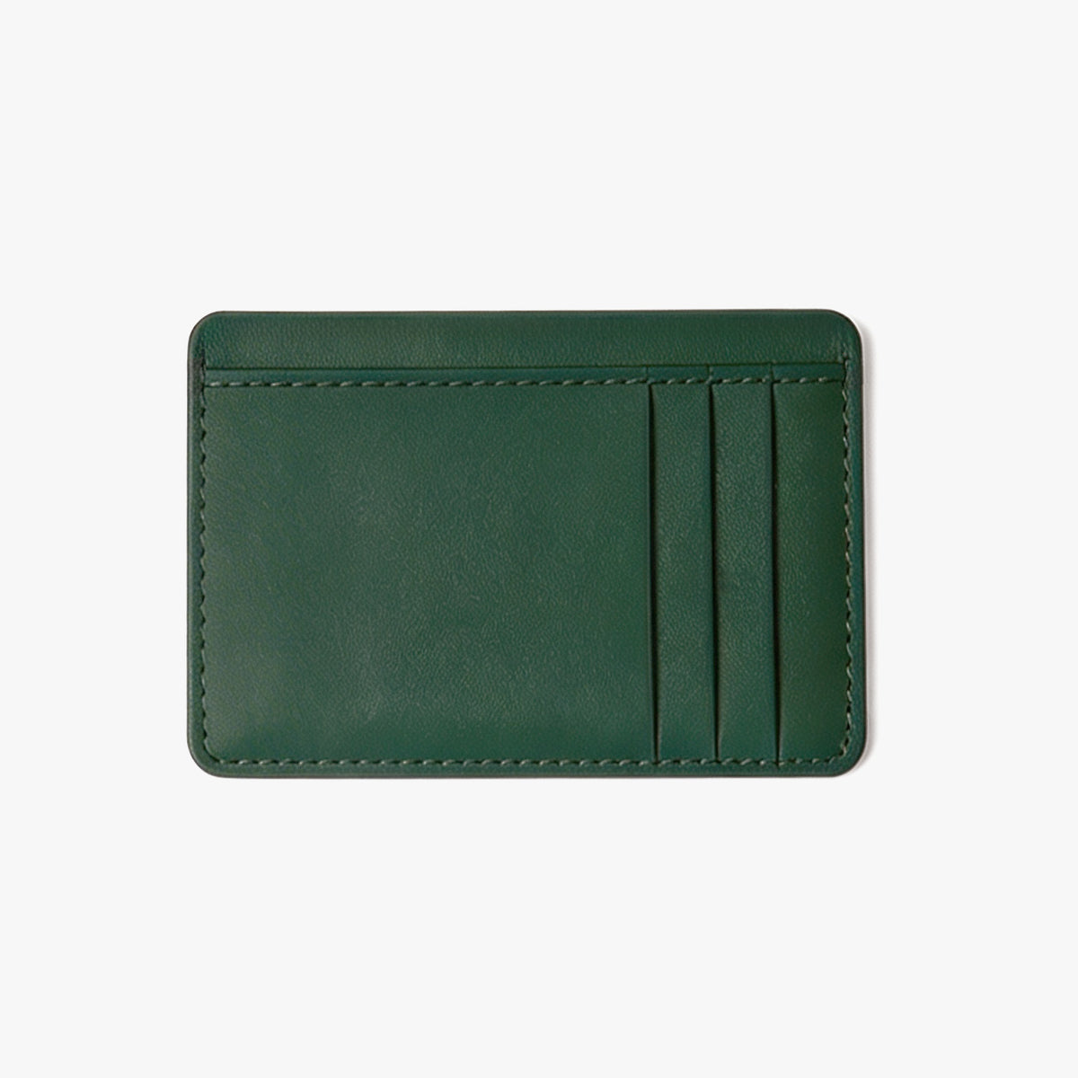 Green leather cardholder on a white background - Evergreen
