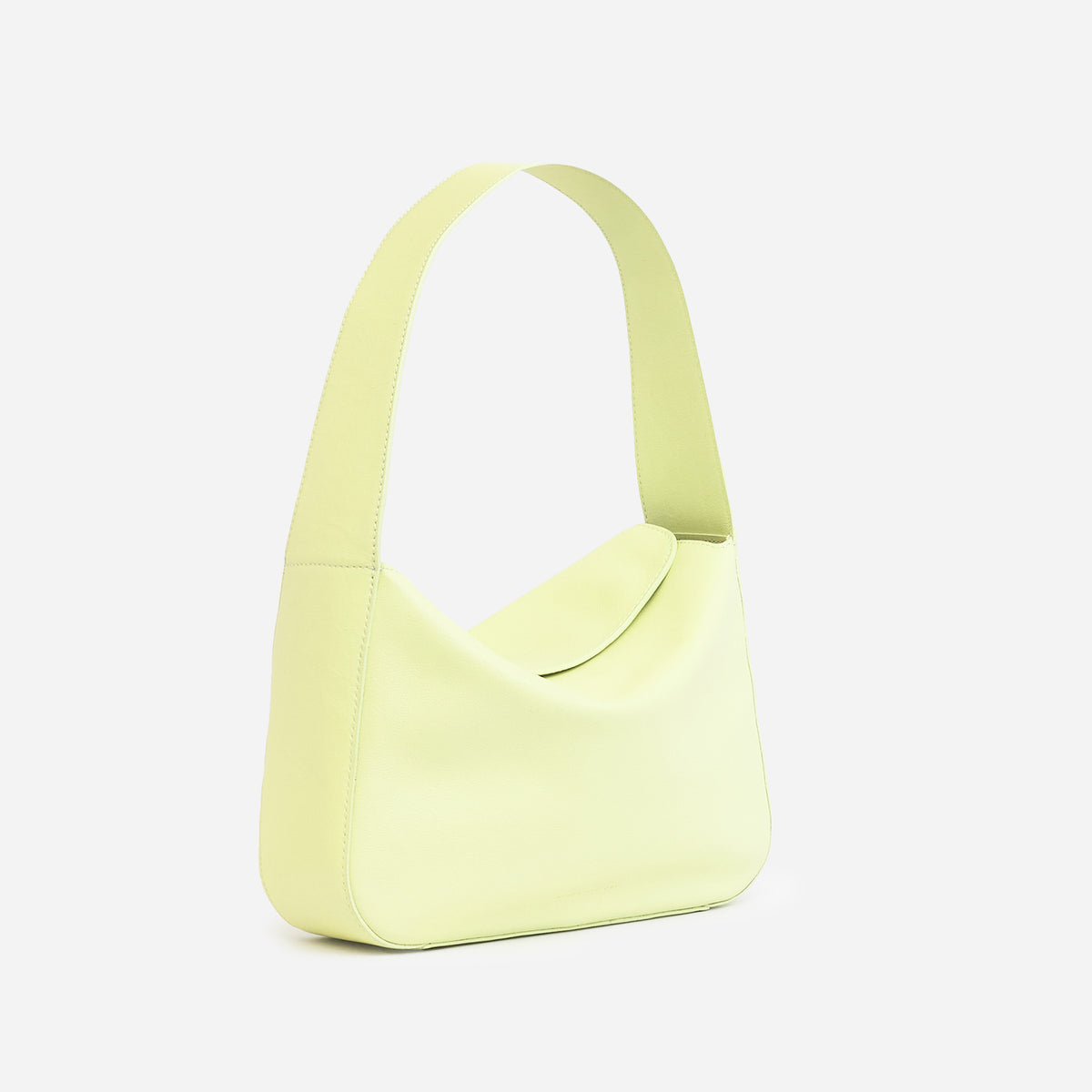 Frame Bag in luxury full-grain leather, styled as a shoulder bag with soft folds