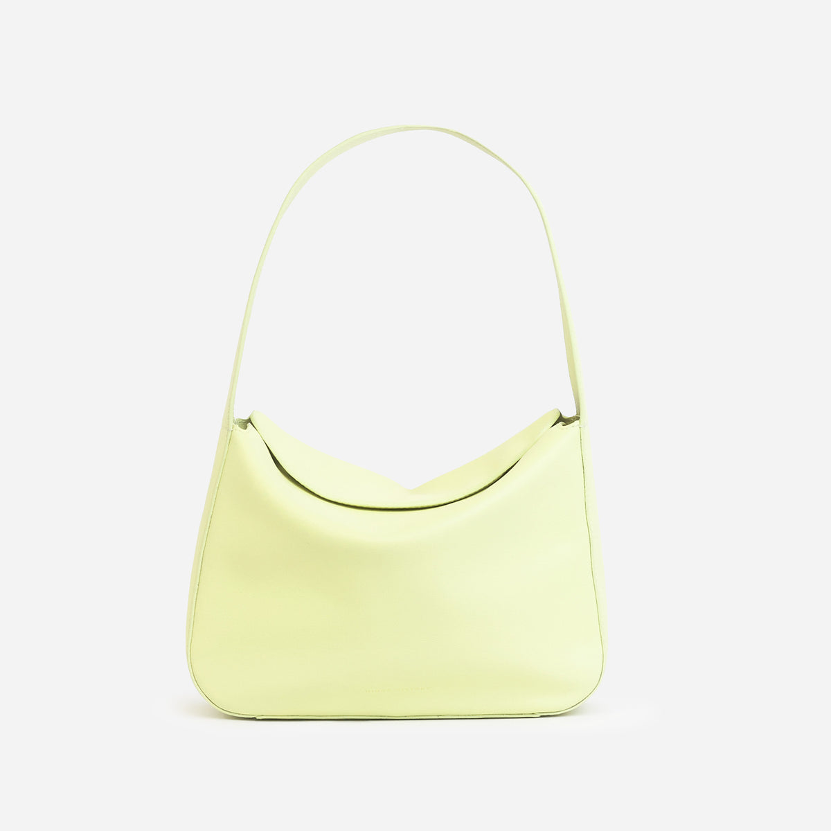 Frame Bag in luxury full-grain leather, styled as a shoulder bag with soft folds