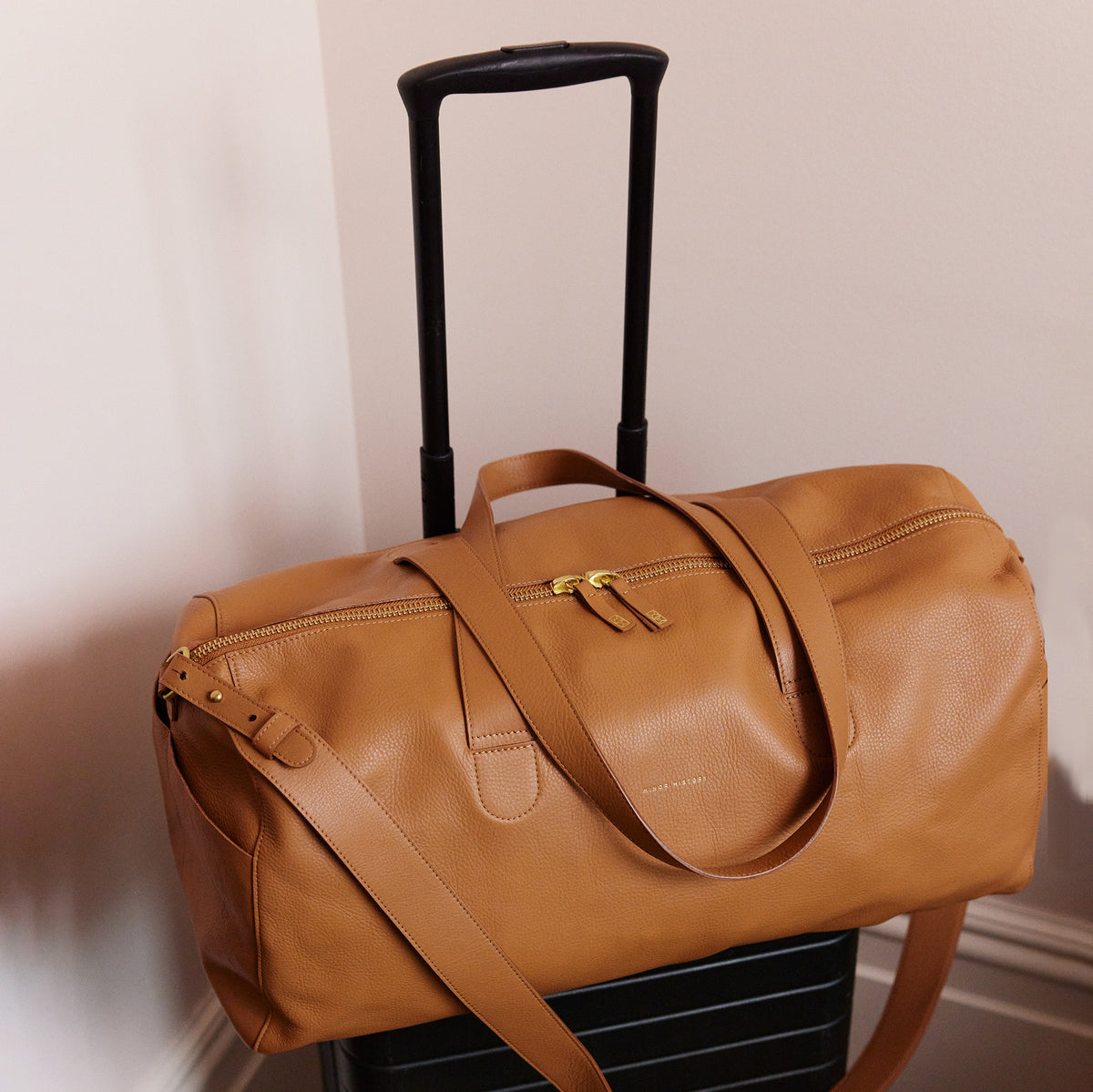 Saddle leather Getaway Duffle Bag, side profile
