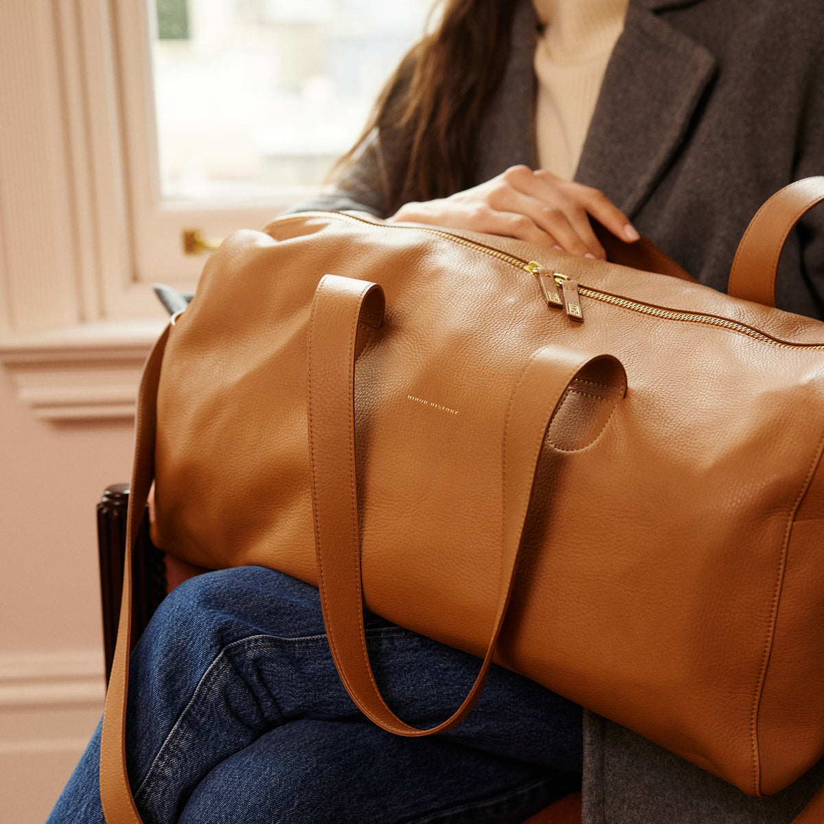 Getaway Duffle Bag in saddle leather, angled display