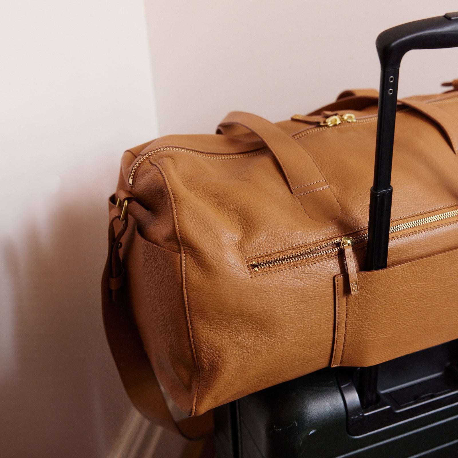 Full view of Getaway Duffle Bag in saddle leather
