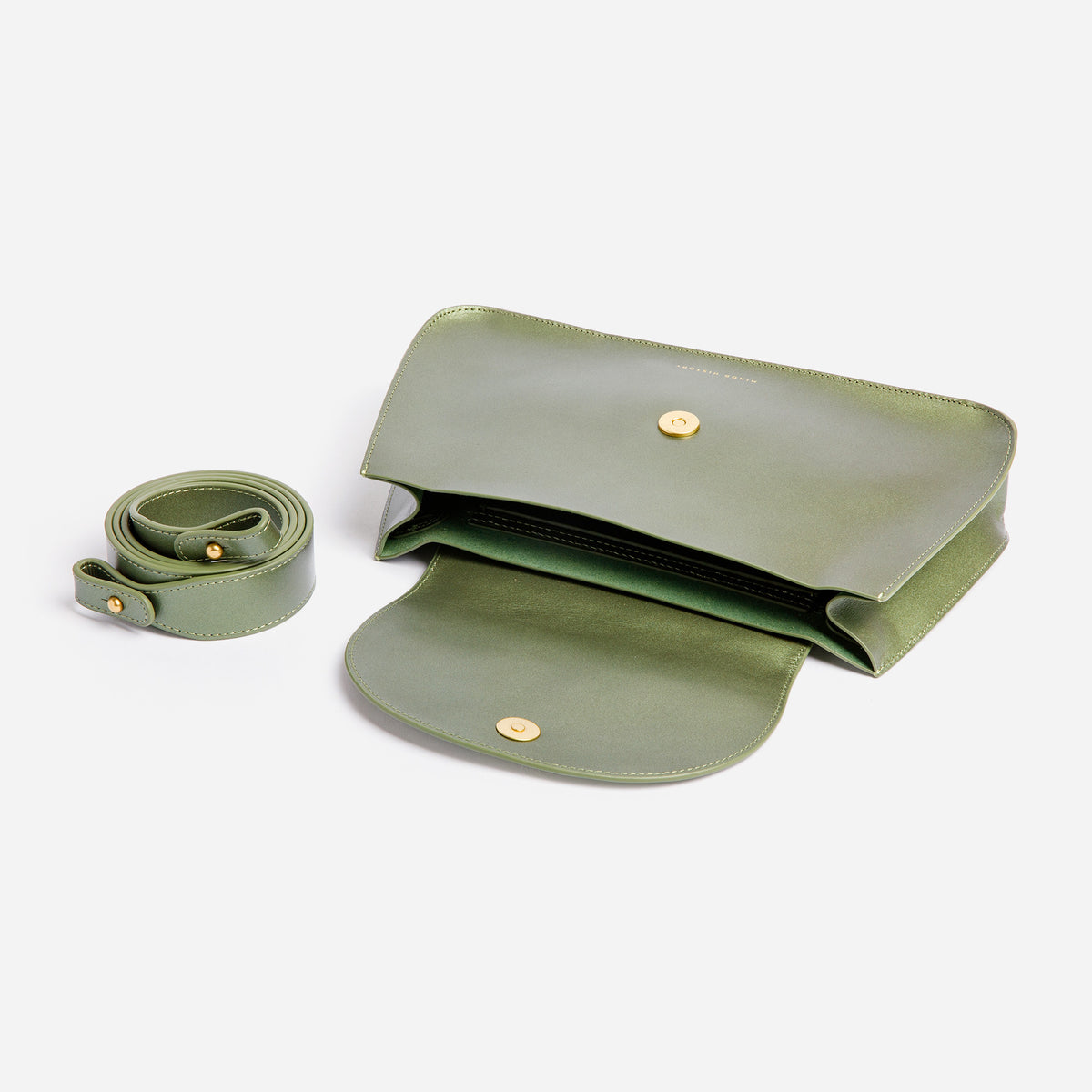 Close-up of Horizon Crossbody in Jaded Green showing soft leather texture