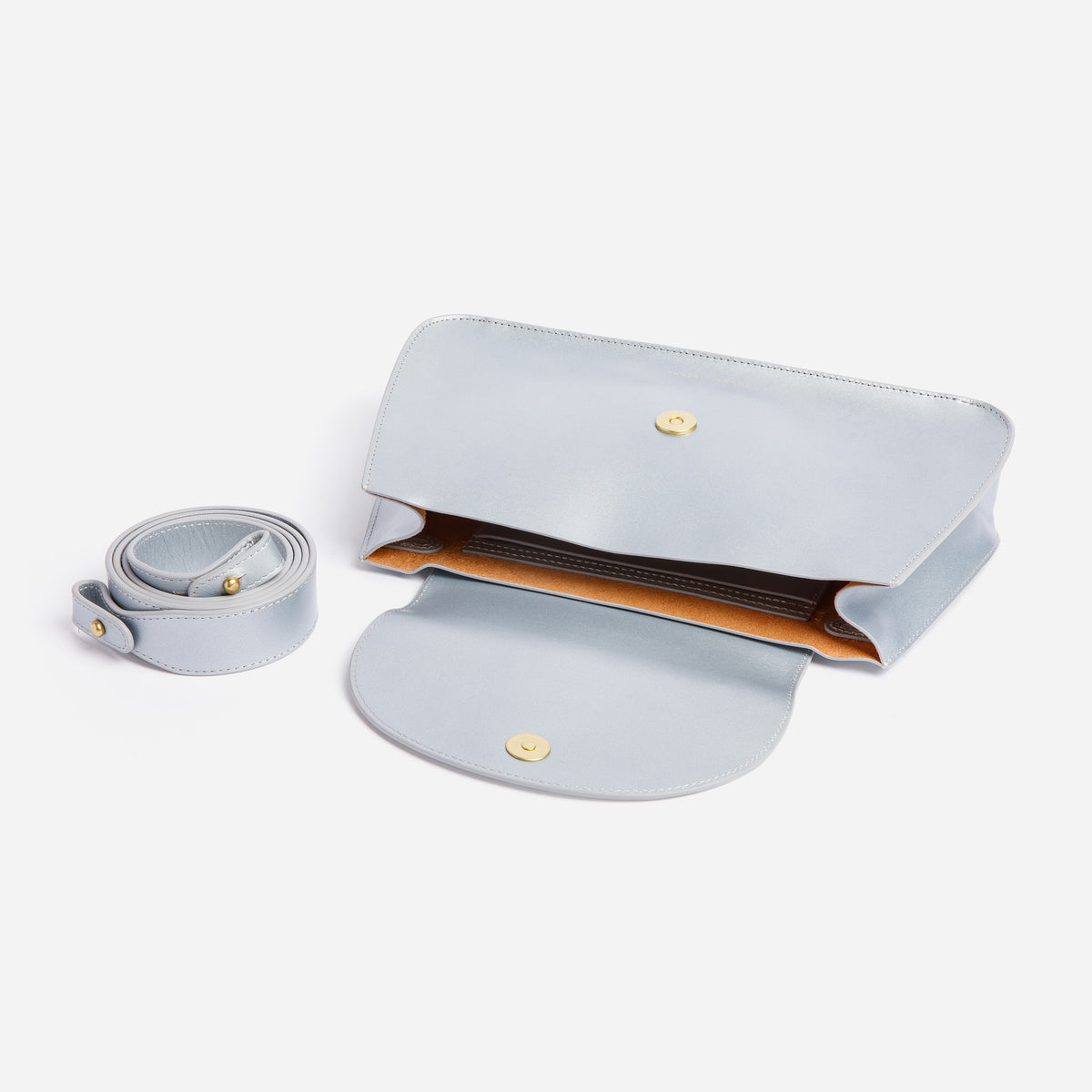 Side view of Horizon Crossbody in Sterling Silver full-grain leather