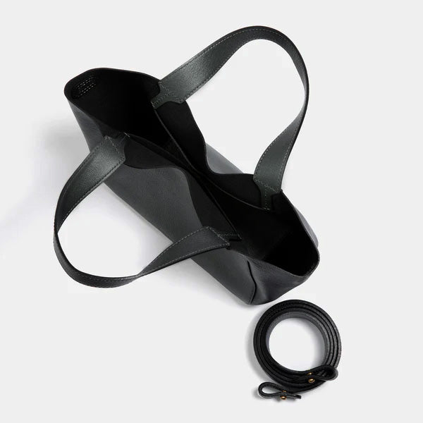 Black leather bag with strap on a white background  - Black