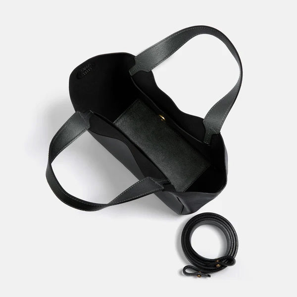 Black Little Times Tote, viewed from above with the top open and removable strap beside it - Black