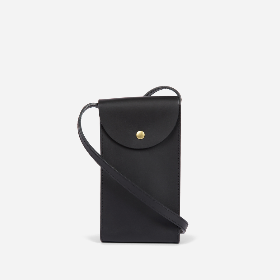 Black Mini Bandit Phone Bag, front view with rounded snap flap and long strap - Black