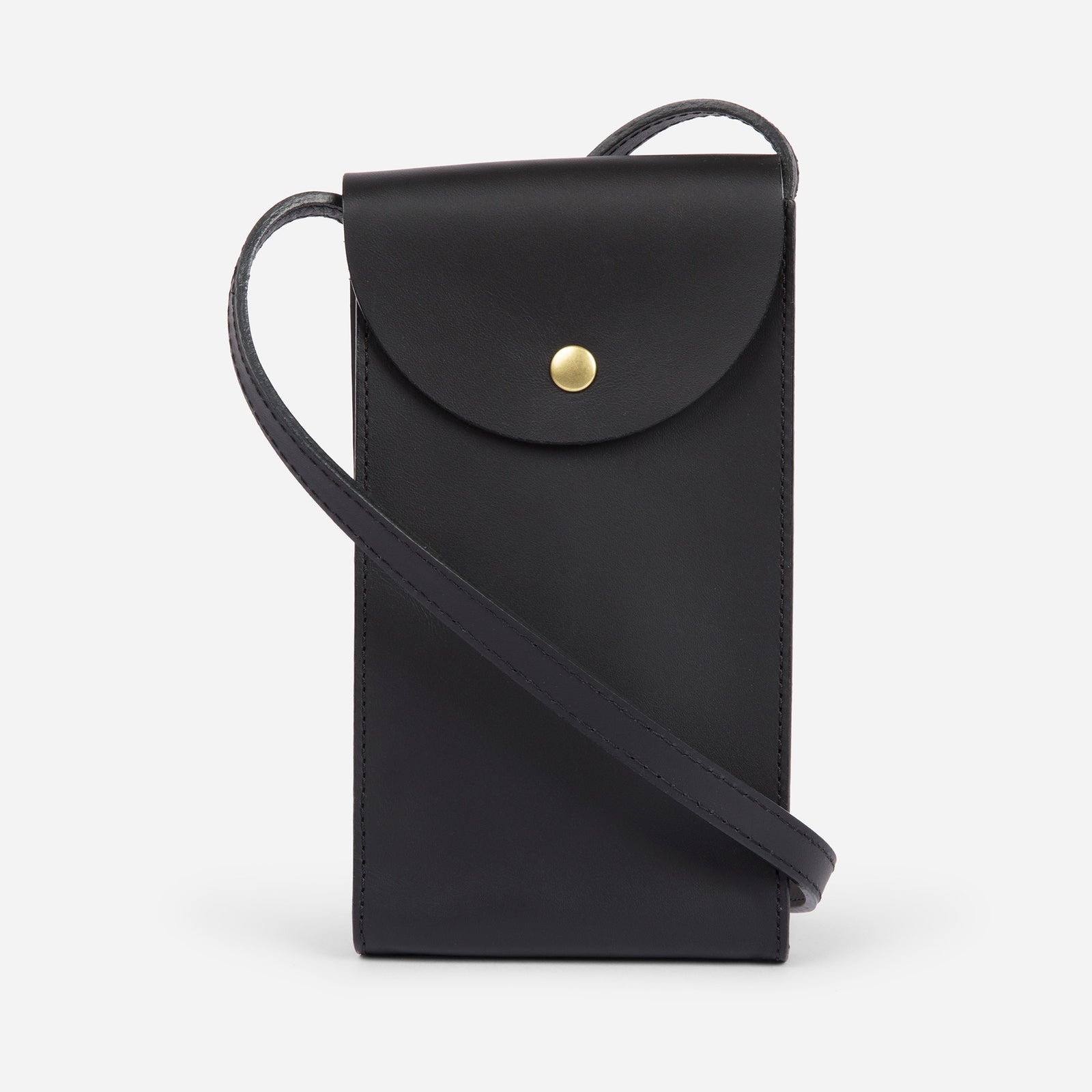 Mini Bandit crossbody bag in black full-grain leather, cropped view highlighting texture and stitching