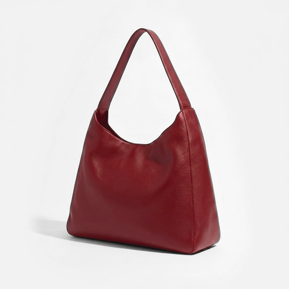Red handbag on a light gray background - Cherry Cola