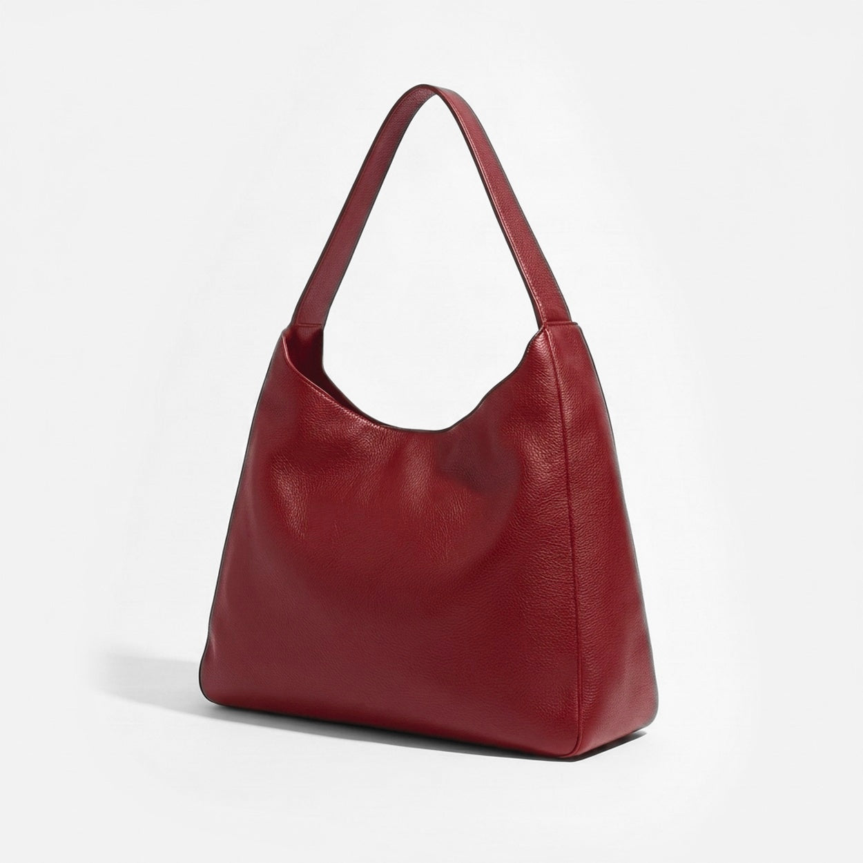 Red handbag on a light gray background - Cherry Cola