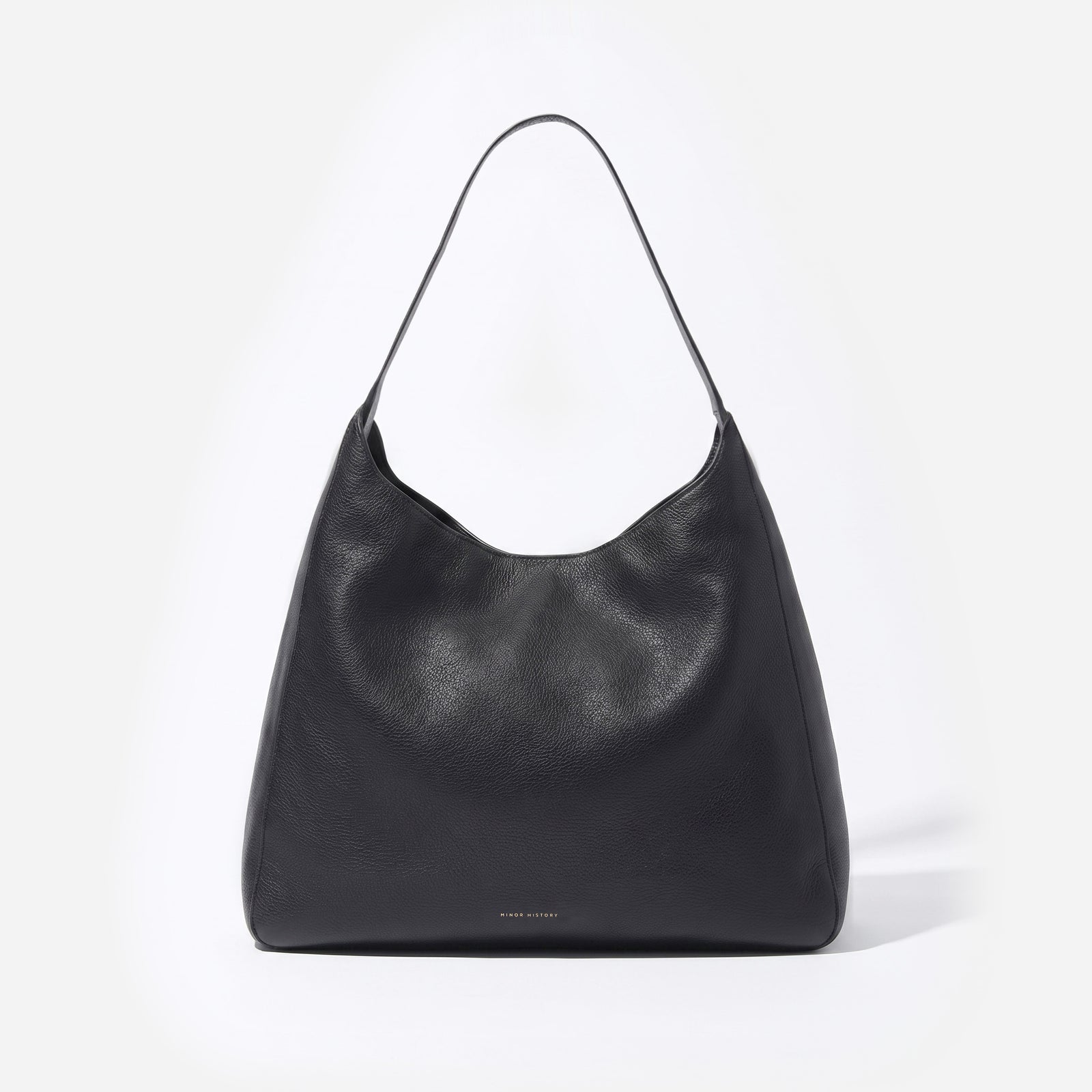 Overtime Tote in full-grain leather, open view showing spacious interior - Black