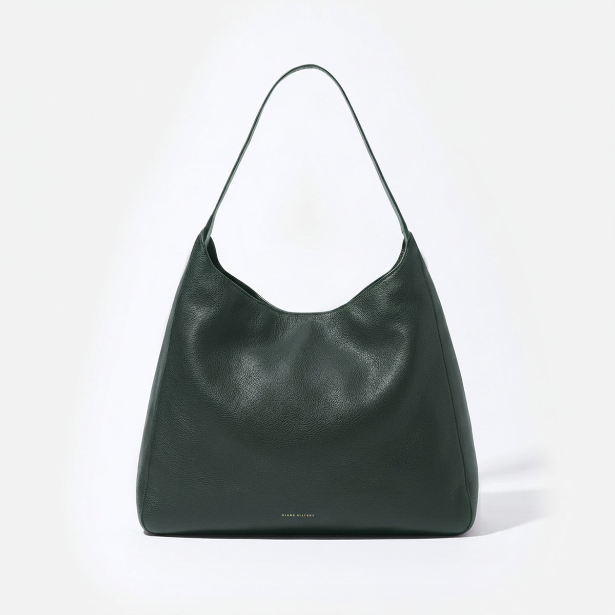 Green handbag on a white background  - Evergreen