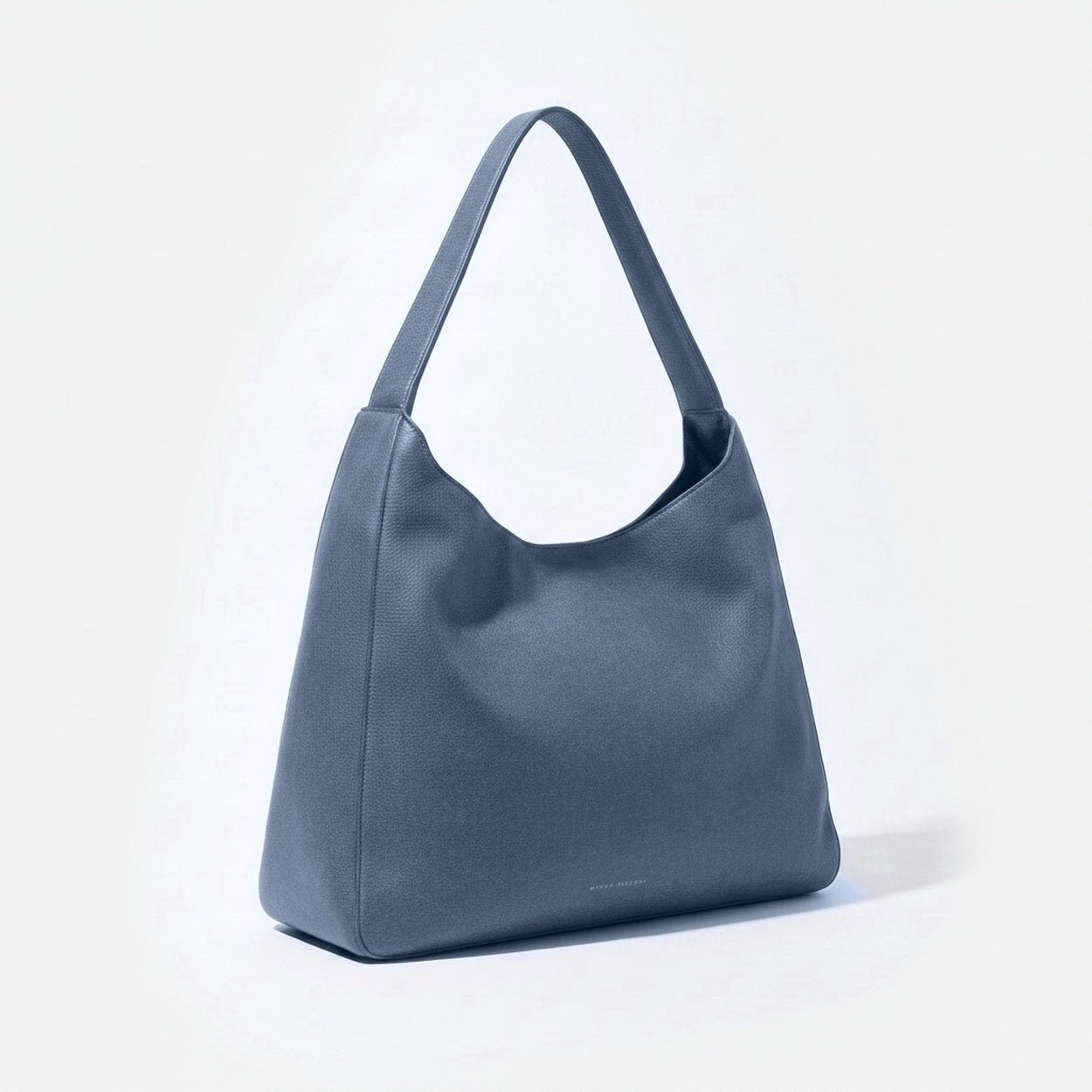 Blue handbag on a light gray background - Chambray