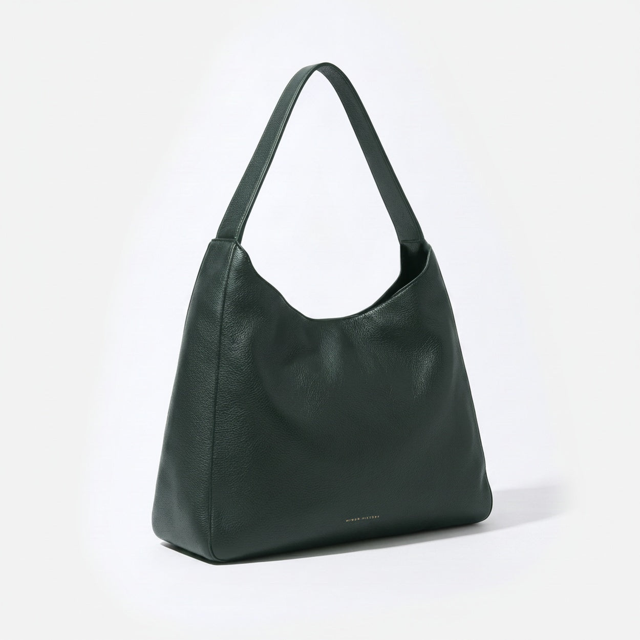 Green handbag on a white background  - Evergreen
