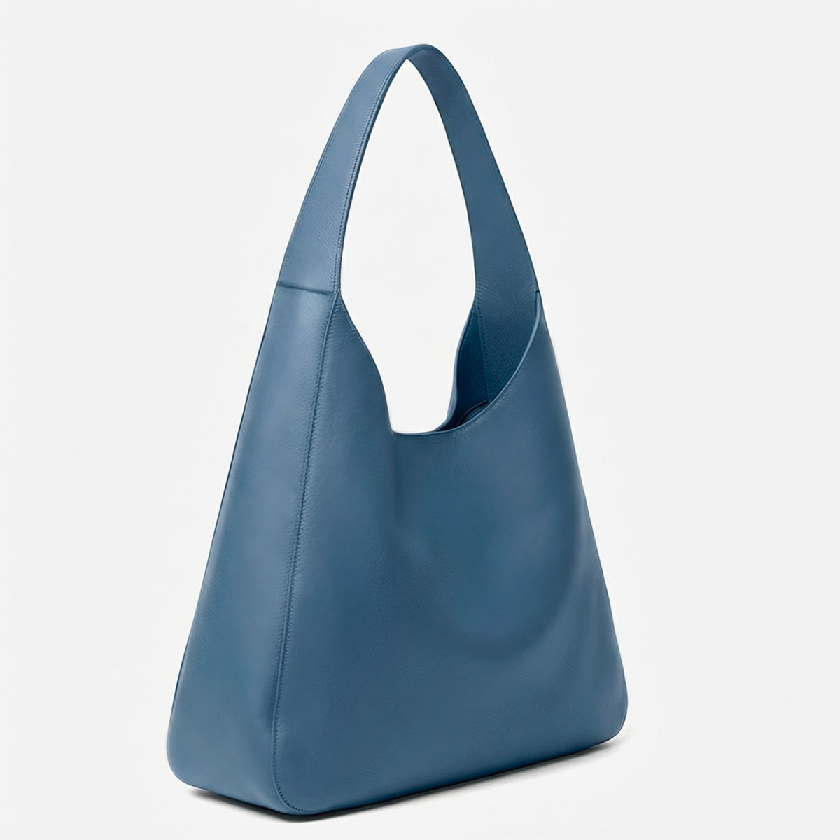 Blue handbag on a light gray background  - Chambray
