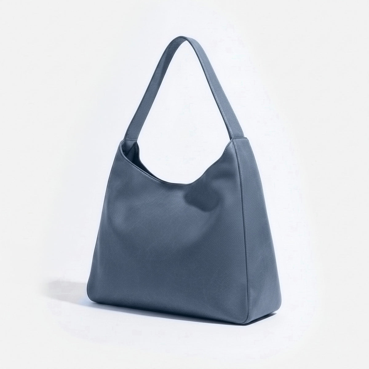 Blue handbag on a light gray background - Chambray