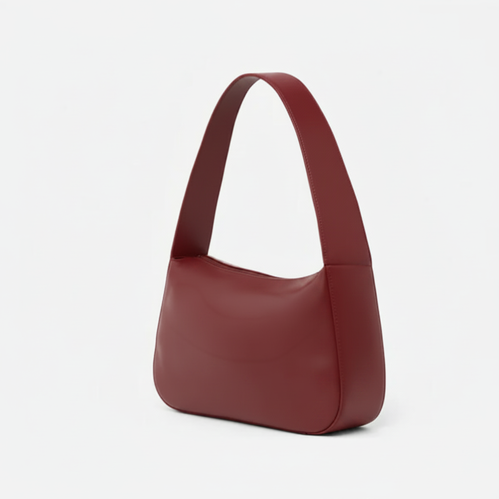 Red handbag on a light gray background - Cherry Cola