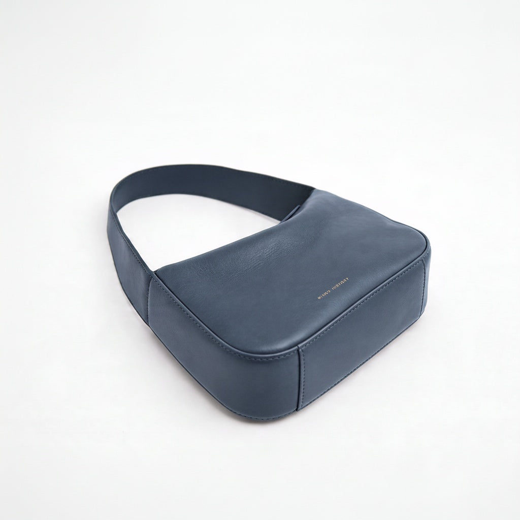 Blue handbag on a white background - Chambray