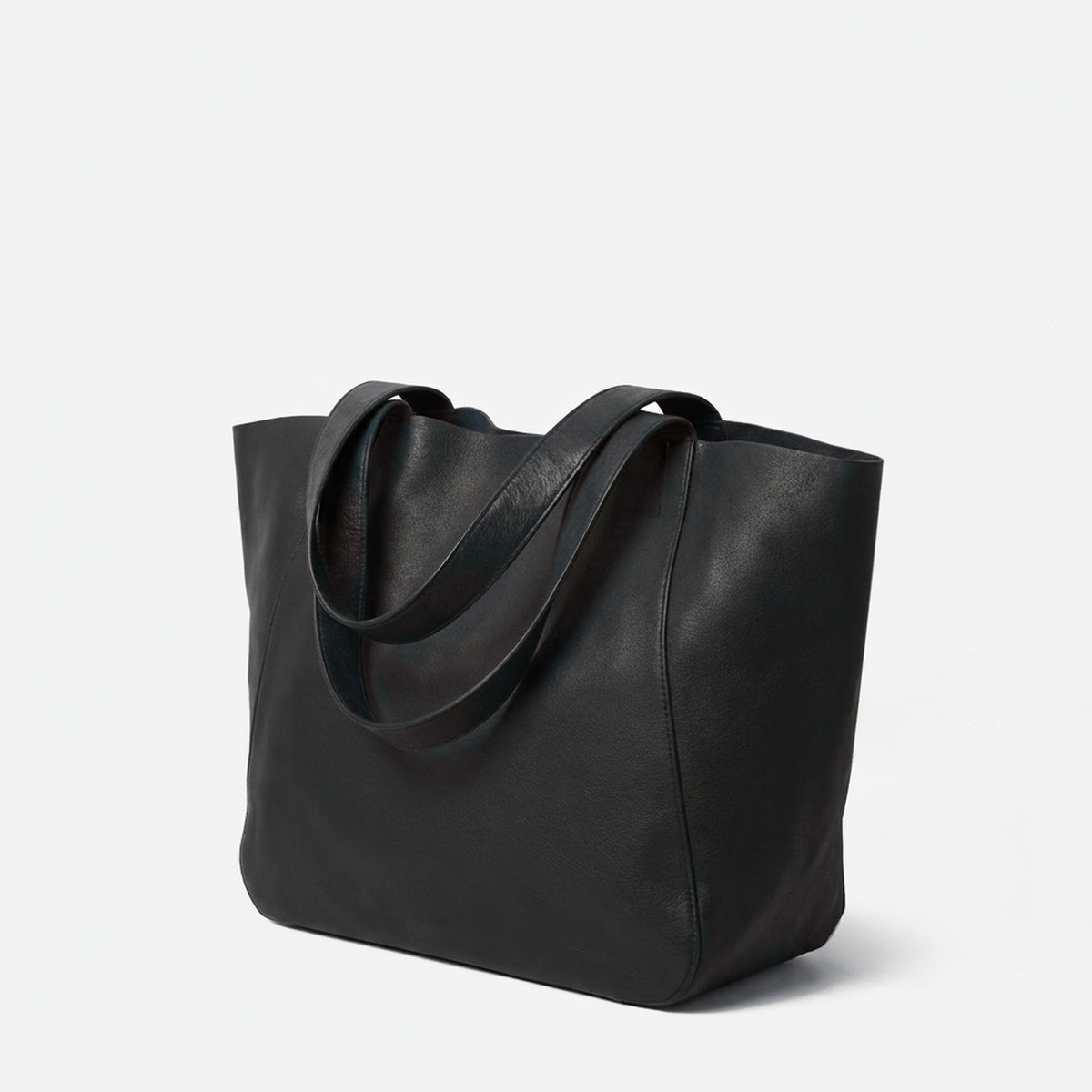 Black leather tote bag on a light gray background - Black