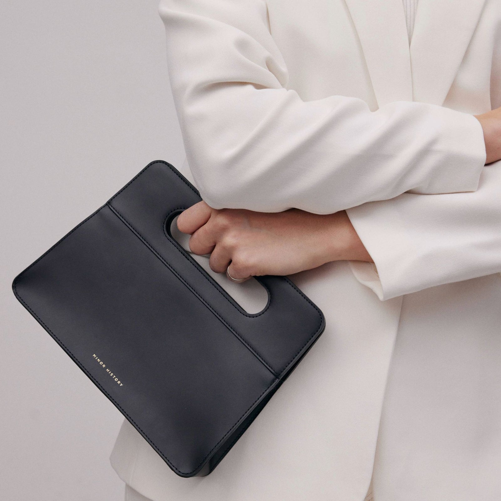 Artistic brand image showcasing craftsmanship details of Minor History products  - Black