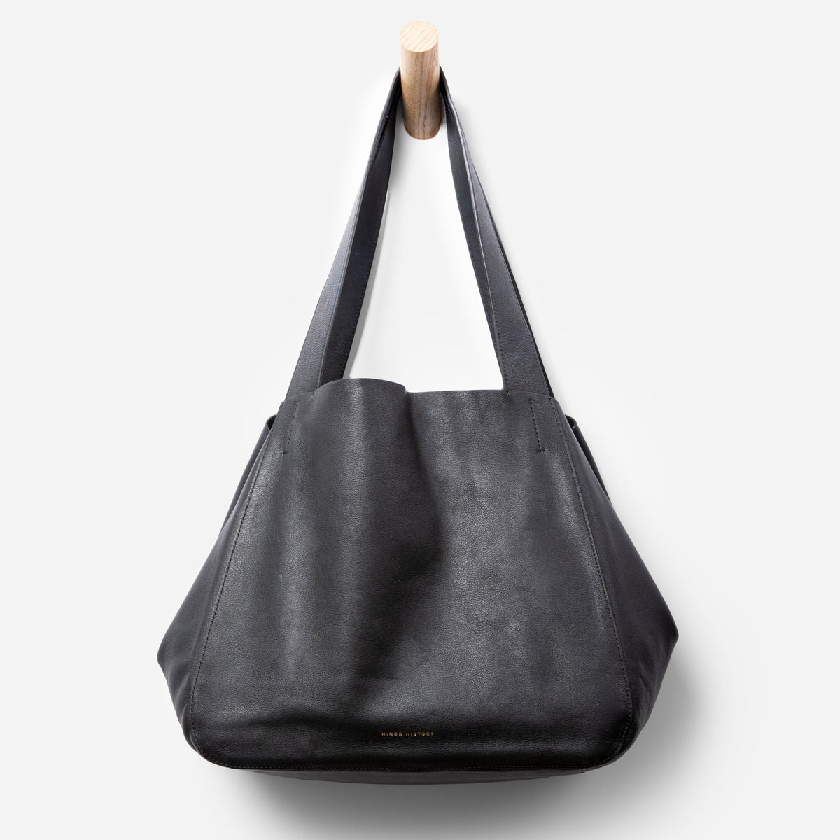 Black leather Times Tote by Minor History in styled photoshoot