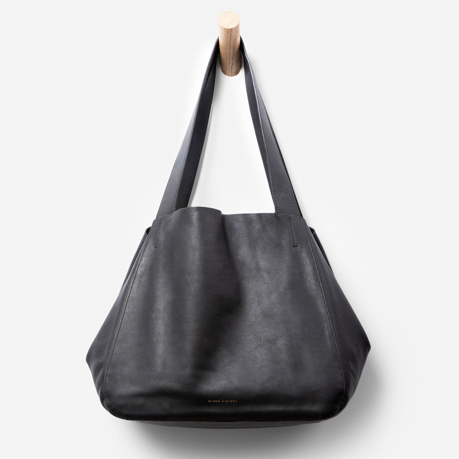 Black leather Times Tote by Minor History in styled photoshoot