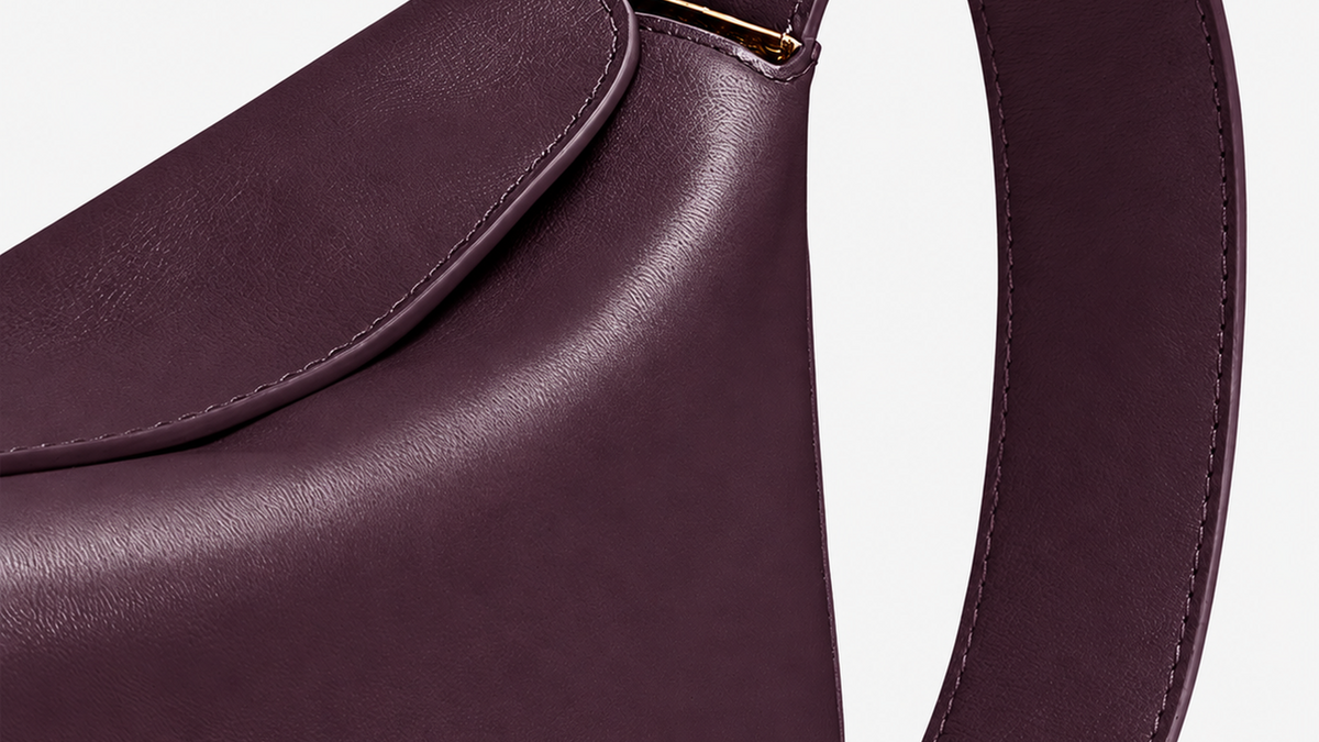 Close-up of Midnight Fig leather and strap