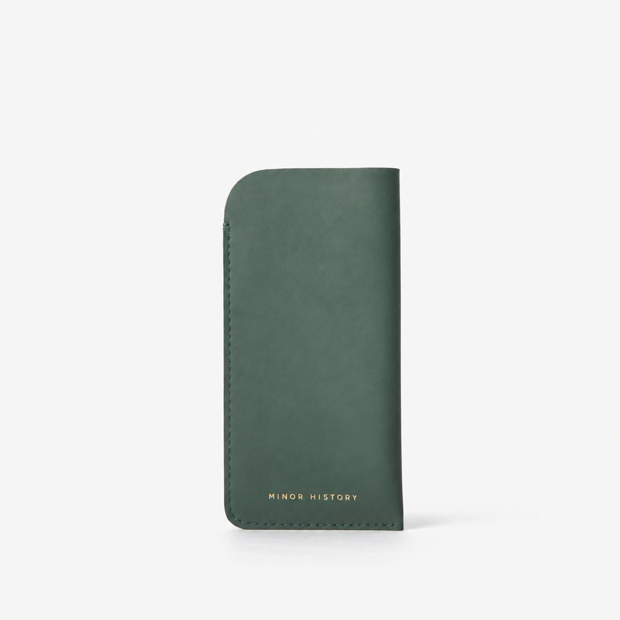 Evergreen Looker Glasses Case, front view showing the logo on a light studio background - Evergreen