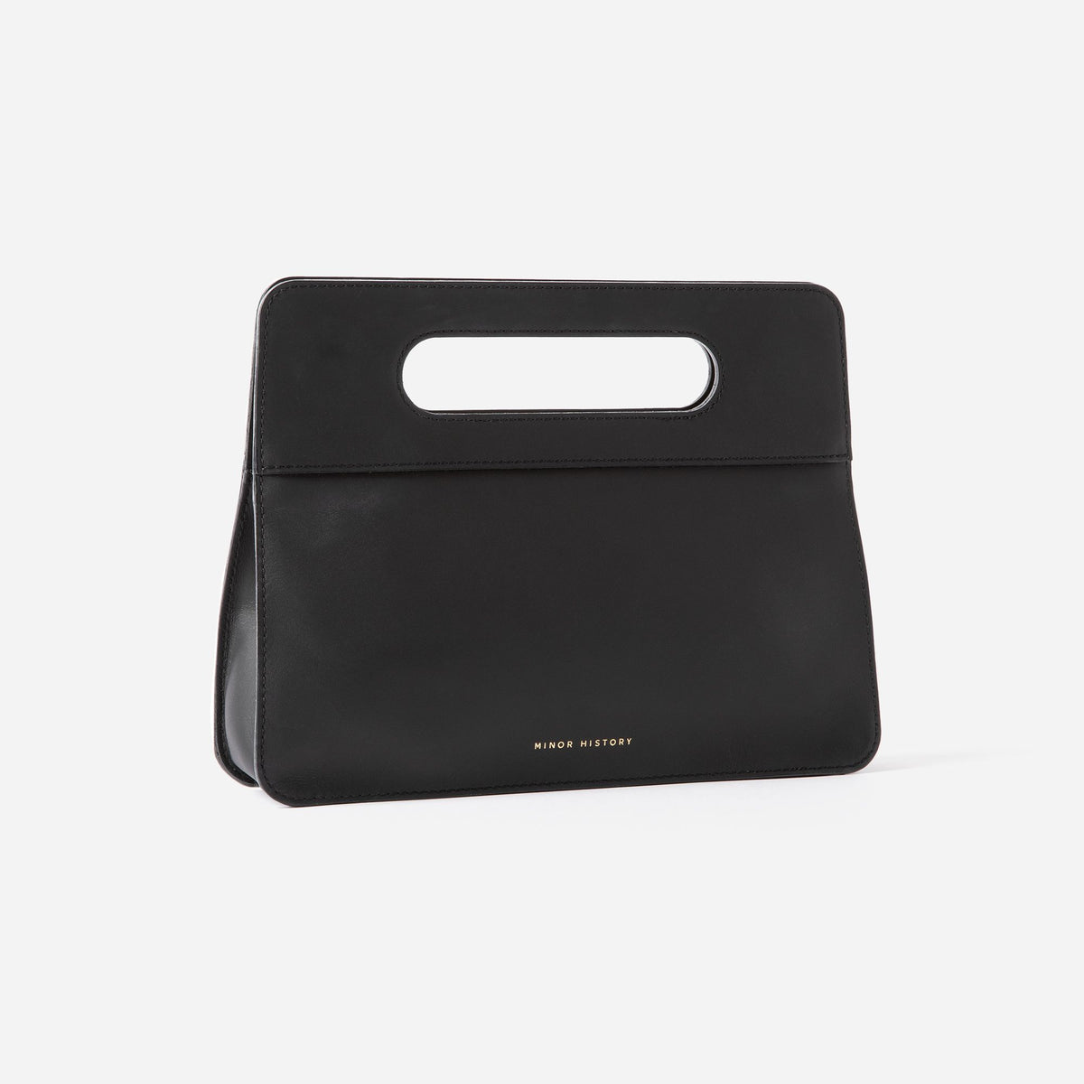 Product styling photo featuring Minor History handbag with natural lighting