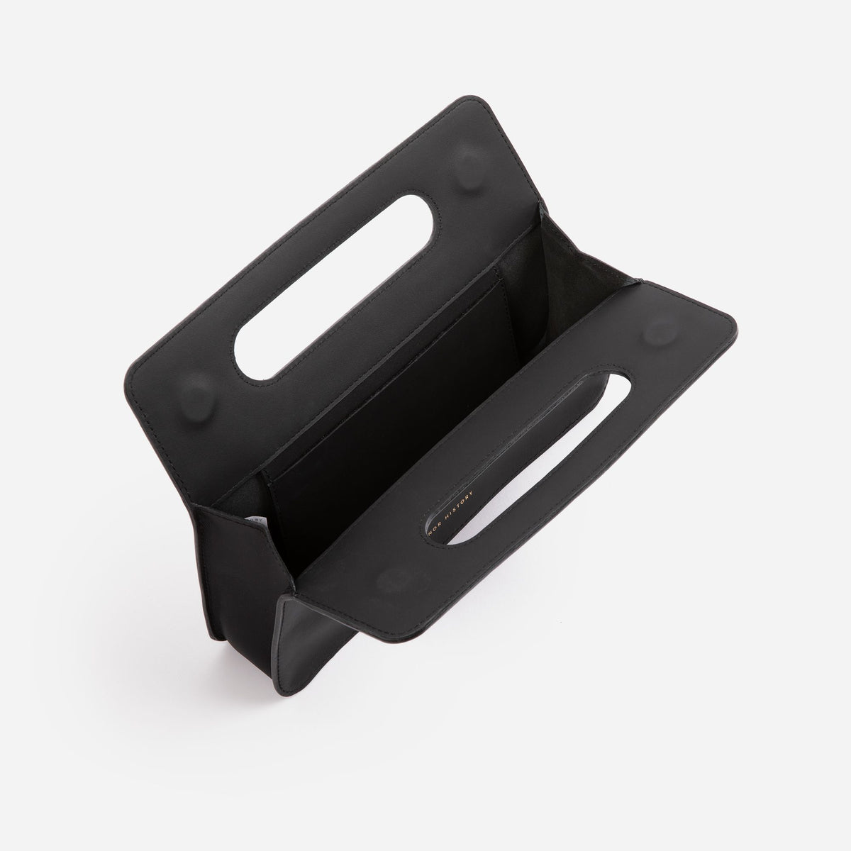 Minor History leather goods in styled flat lay with accessories